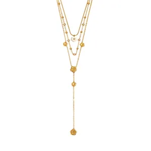 Elegant multi-layer gold Y-necklace with flower and zircon charms, stainless steel
