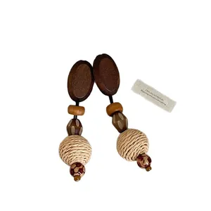 Elegant bohemian retro straw-woven and wood dangle earrings for a beach vacation look