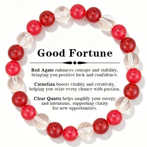 Detail of 8mm red agate and carnelian healing crystal bracelet with clear quartz