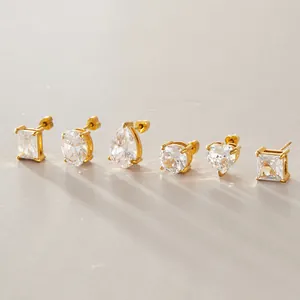 Detailed view of stainless steel gold stud earrings in heart, round, and geometric shapes.