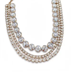 Elegant multi-layered gold-tone collar necklace featuring sparkling round rhinestones