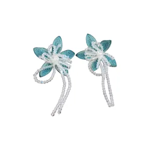 Handmade elegant blue fabric flower stud earrings with shimmering clear crystal bead tassels