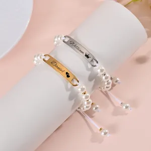 Close-up detail showing customized engraved names on 8mm imitation pearl baby bracelets