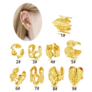 Gold stainless steel non-pierced ear cuff set with elegant flower and leaf designs
