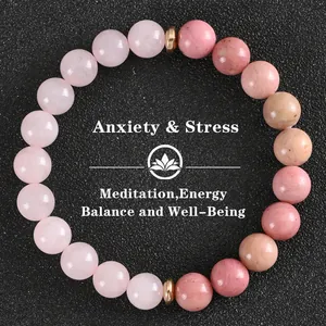 Bracciale in perle di quarzo rosa naturale per meditazione e sollievo dallo stress.