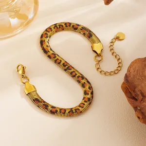 Detailed view of gold-plated leopard print snake chain bracelet in stainless steel.