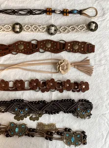 Collection of Bohemian ethnic style waist chains with flower, bead, and tassel details