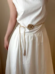 Bohemian style faux suede waist chain belt with decorative flower and tassel detail