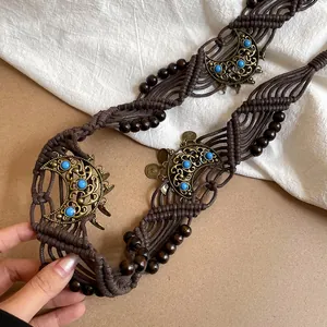 Bohemian brown woven waist chain with turquoise beads and crescent moon accents