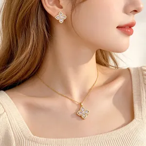 Elegant titanium steel jewelry set featuring sparkling clover flower necklace and stud earrings