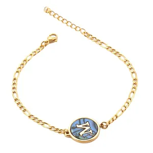 Elegant 18K gold plated stainless steel bracelet with natural shell inlay and letter W charm
