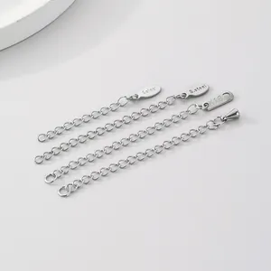 Set van vier roestvrijstalen sieraden verlengkettingen voorzien van K18 en S.steel labels