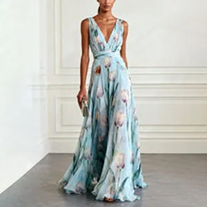 Elegant light blue maxi dress featuring a deep V-neck and beautiful floral tulip prints throughout.