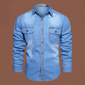 Close-up of a men's blue long-sleeved denim shirt with double chest pockets and brand tag.