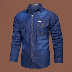 Macro view of a blue long-sleeve denim-style shirt featuring buttoned double chest pockets