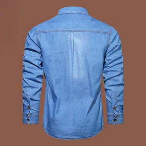 Detailed back view of a light blue washed long-sleeve denim shirt for men featuring a pleat