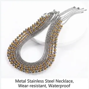 Detailed view of durable stainless steel bead bracelets in gold and silver finishes.