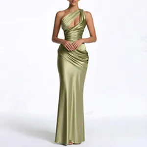 Detail of elegant olive green satin one-shoulder evening gown with cutout design.