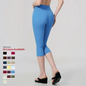 High-waisted cropped yoga leggings for women in vibrant blue brushed fabric, slim fit style