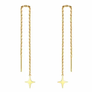 Macro view of elegant gold stainless steel four-pointed star long chain threader earrings