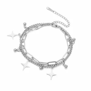 Macro view of stainless steel double-layer bracelet featuring star charms and beads.