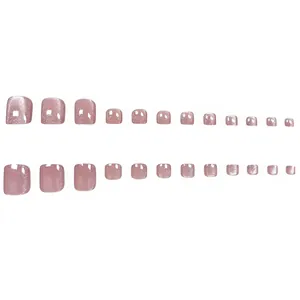 Detail view of shimmering pink cat-eye press-on toenails in a short square set