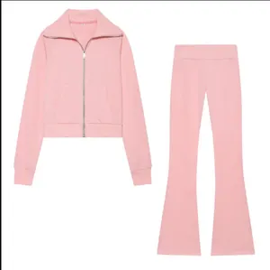 Ensemble jogging rose en polaire deux pièces avec veste zippée et pantalon évasé assorti