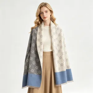 Elegant thick cashmere shawl with clover pattern for women in winter fashion.