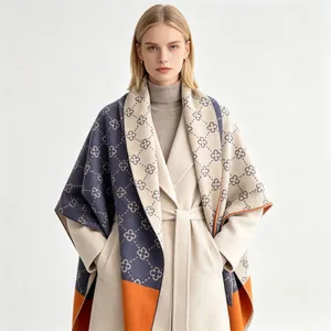 Detail showing the soft texture and geometric clover pattern of cashmere-like shawl