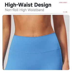 Detail shot of blue high-waist yoga leggings showing the non-slip waistband