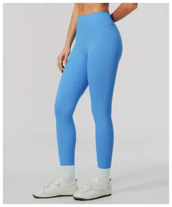 Side view of vibrant light blue high-waisted butt-lifting yoga pants for women