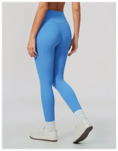 Detailed back view of high waisted light blue butt lifting yoga leggings for fitness
