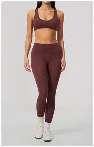 Detailed view of a maroon high-waisted brushed yoga leggings and sports bra fitness set