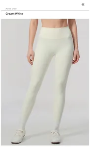 Detailed shot of cream white high-waisted brushed yoga leggings for women's fitness