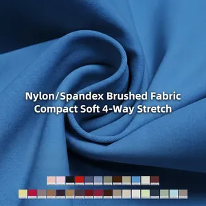 Soft blue brushed nylon spandex fabric for high-waisted yoga pants with four-way stretch.