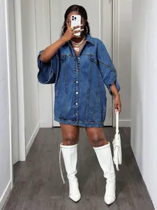 Full length model view showing the oversized fit and flared sleeve design of denim jacket
