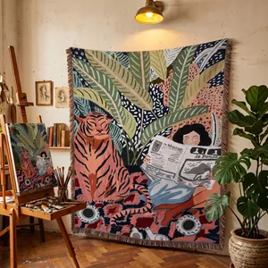 Decorative woven tapestry throw blanket with artistic tiger and jungle plant pattern design.