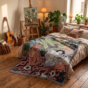 Detail view of Bohemian woven throw blanket with tiger and tropical plant motifs