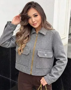 Stylish women's grey zip-up jacket featuring front pockets and soft wool-like texture