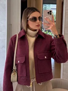 Chic burgundy zip-up jacket with pockets, perfect for trendy autumn outfits.