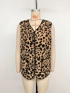 Close-up detail of a women's warm leopard print fleece vest on a dress form mannequin