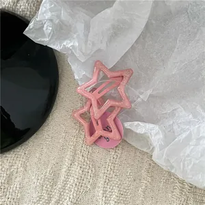 Cute pink glitter star-shaped BB hair clips for children and girls in a Korean style design