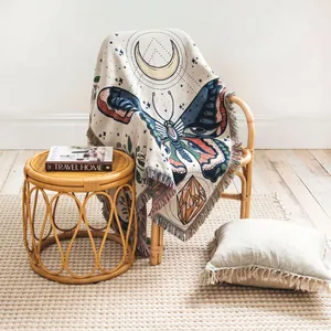 Bohemian woven cotton throw blanket featuring butterfly moon patterns for home decor