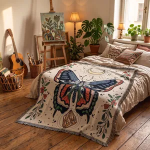 Detailed texture of bohemian butterfly woven throw blanket in a cozy bedroom setting