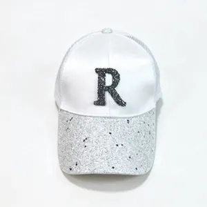 White satin baseball cap with rhinestone letter R and glittery brim for women