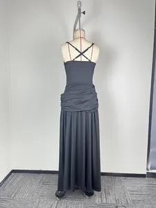 Back view of black sleeveless maxi dress with criss-cross straps and ruched waist