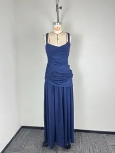 Full-length view of navy blue pleated evening dress on a professional mannequin