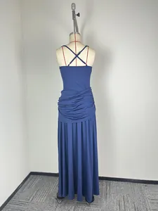 Back view of a sleeveless dark blue maxi dress with elegant cinched waist details