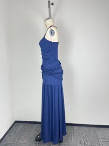 Side profile detail of a navy blue sleeveless maxi dress with gathered waist