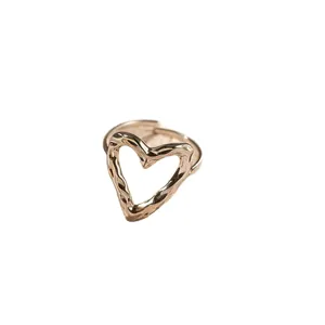 Minimalist titanium steel adjustable ring with an irregular hollow heart design